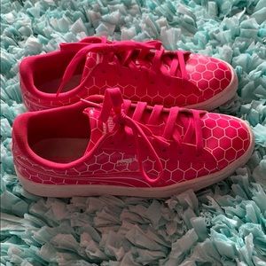 Puma pink and white patent sneakers